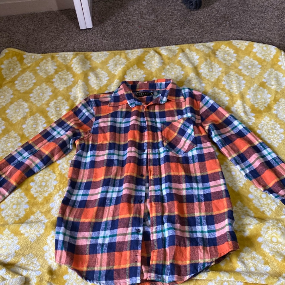 Multi colored orange base flannel